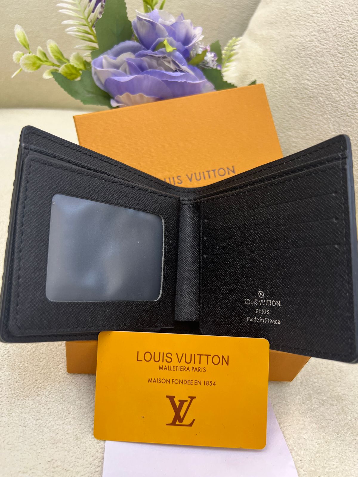 Lo-uis Vuitton Monogram Embossed Bi-Fold Wallet Style