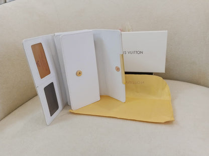 Louis Vuitton Monogram Flap Wallet with LV Lock