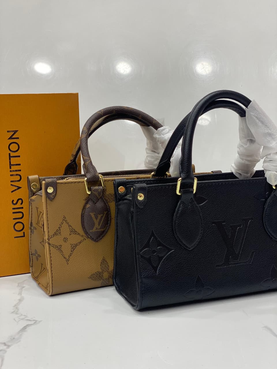 Louis Vuitton OnTheGo East West Chain Monogram Reverse Canvas