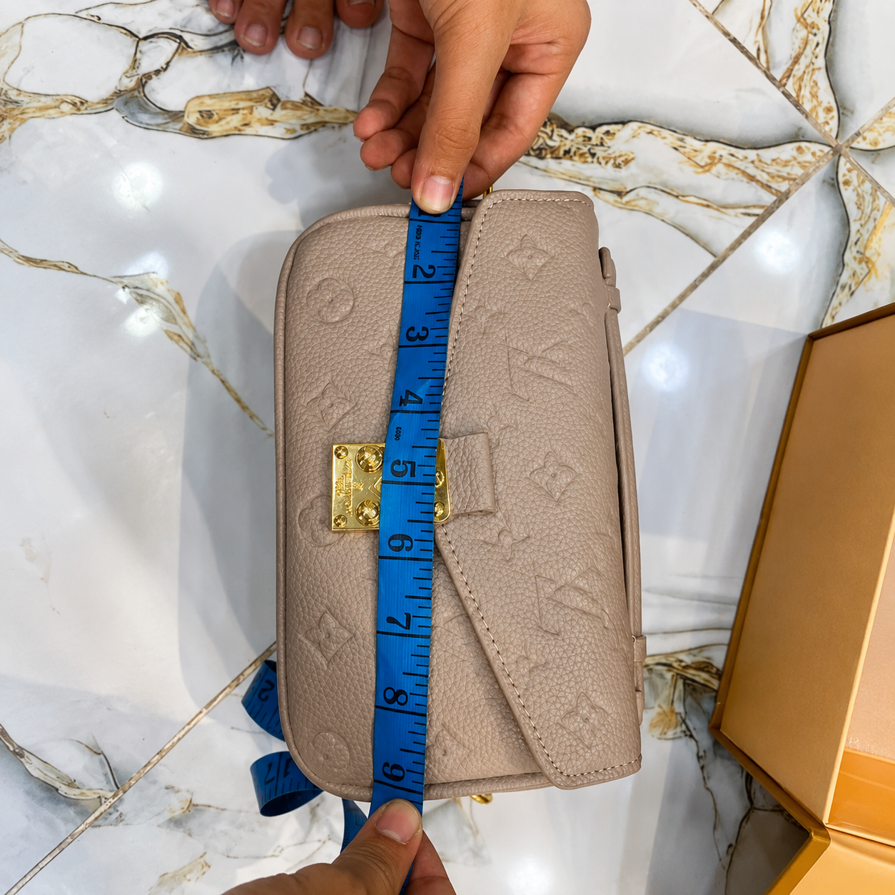 Louis Vuitton Pochette Métis Monogram Empreinte Crossbody Bag