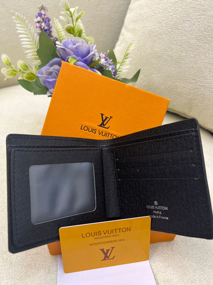Lo-uis Vuitton Taiga Leather Bi-Fold Wallet Style