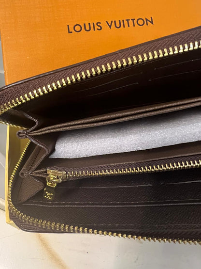Louis Vuitton Textured Zip Wallet Style