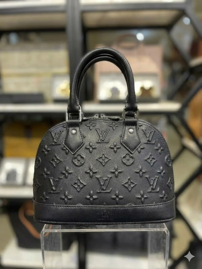 Lo-uis Vuitton Alma BB Monogram Empreinte Leather Handbag (Exclusive edition)