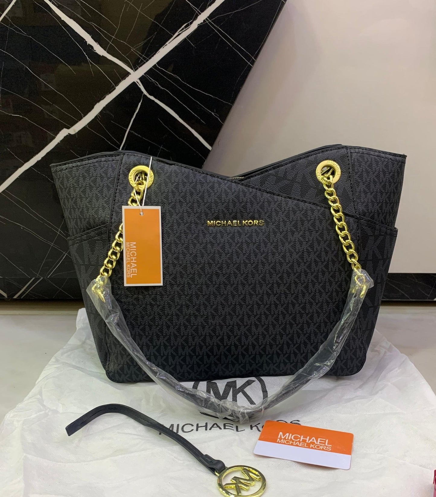 Michael Kors Jet Set Travel Medium Chain Tote in Signature Logo Canvas (Black)
