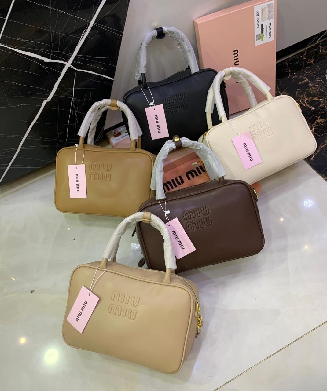Miu Miu Embossed Logo Top-Handle Shoulder Bag