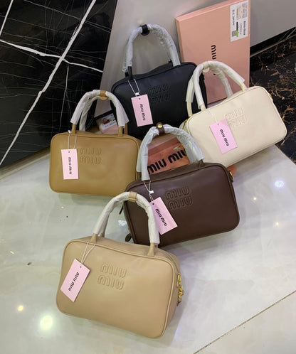 Miu Miu Embossed Logo Top-Handle Shoulder Bag