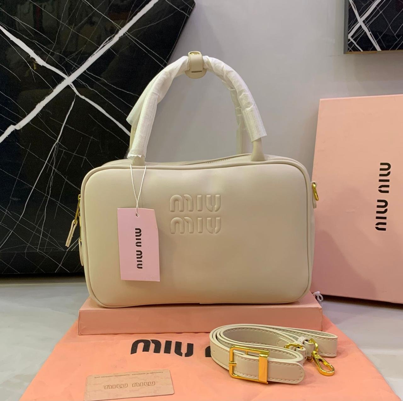Miu Miu Embossed Logo Top-Handle Shoulder Bag