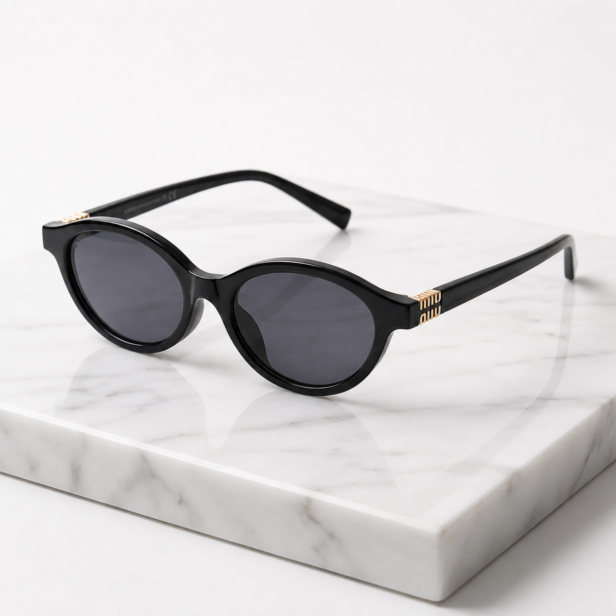 Miu Miu Classic Oval Sunglasses