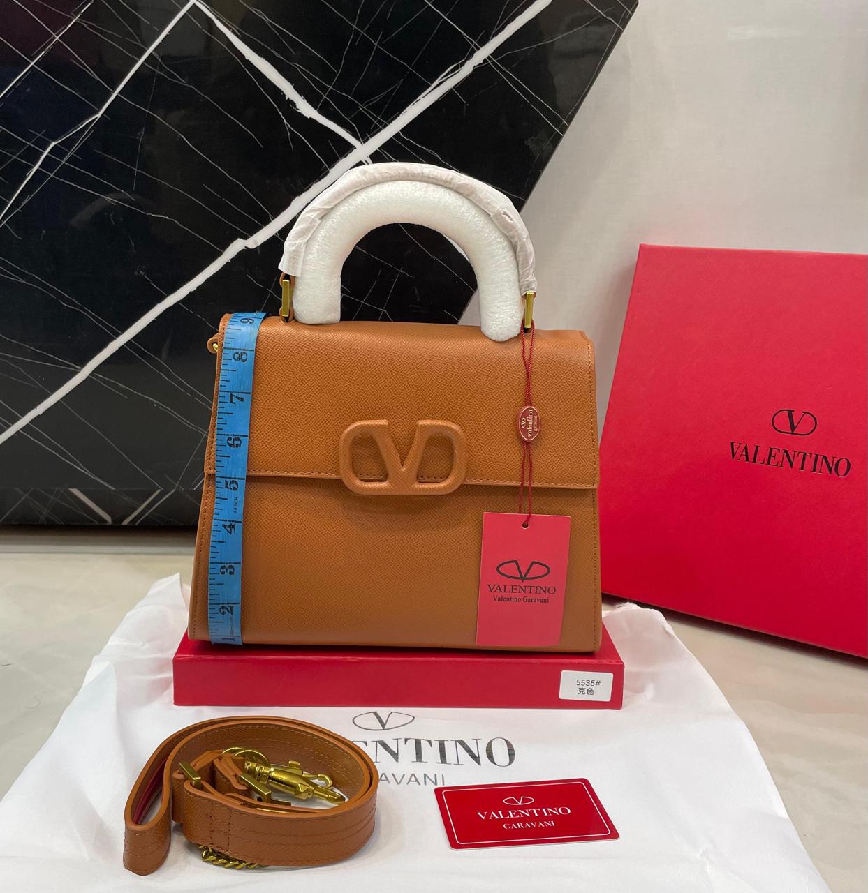Valentino Garavani VLogo Signature Top Handle Bag in Grained Leather