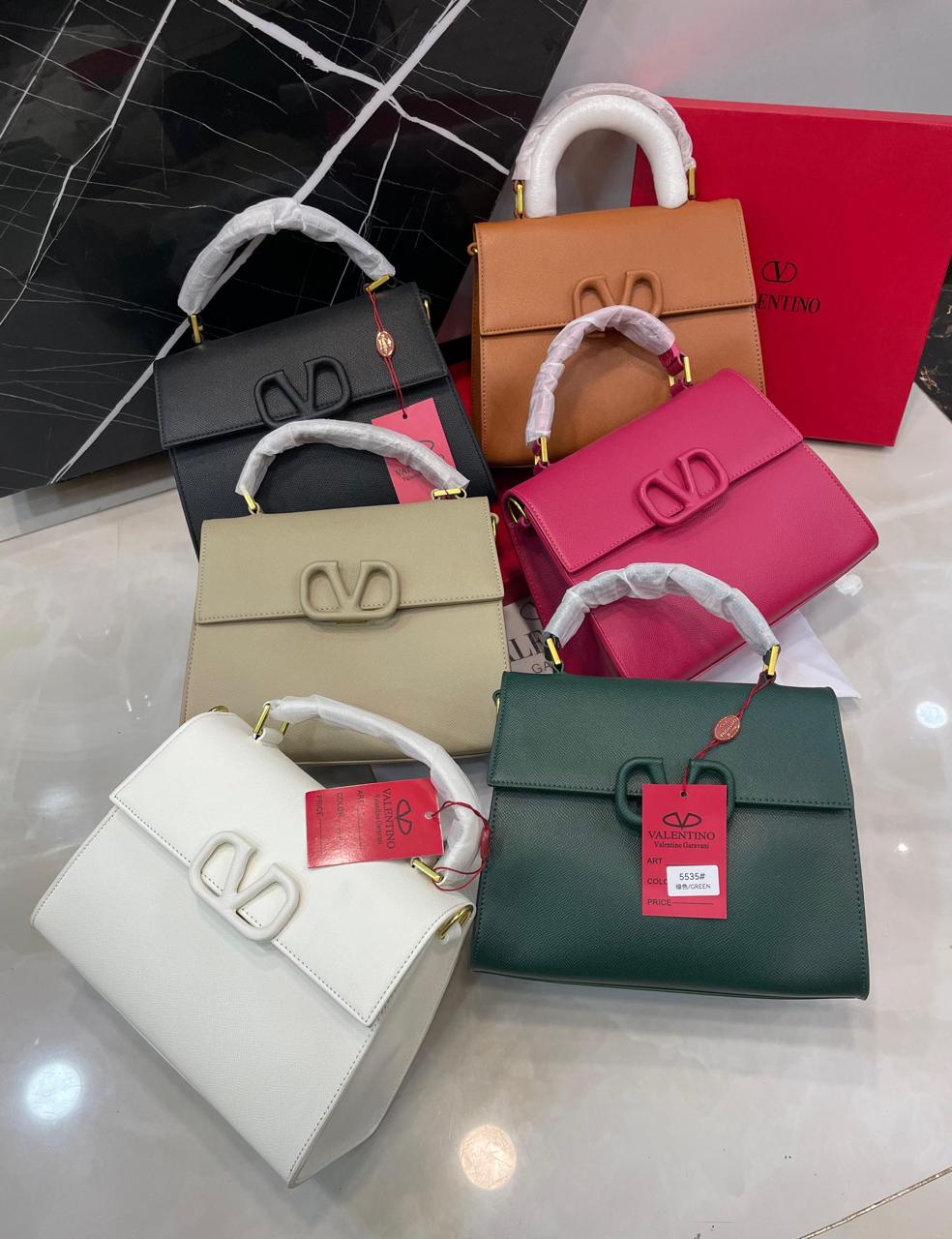 Valentino Garavani VLogo Signature Top Handle Bag in Grained Leather