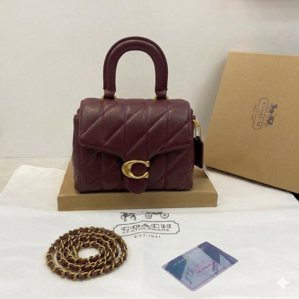 CoachTabby Quilted Top Handle Bag in leather