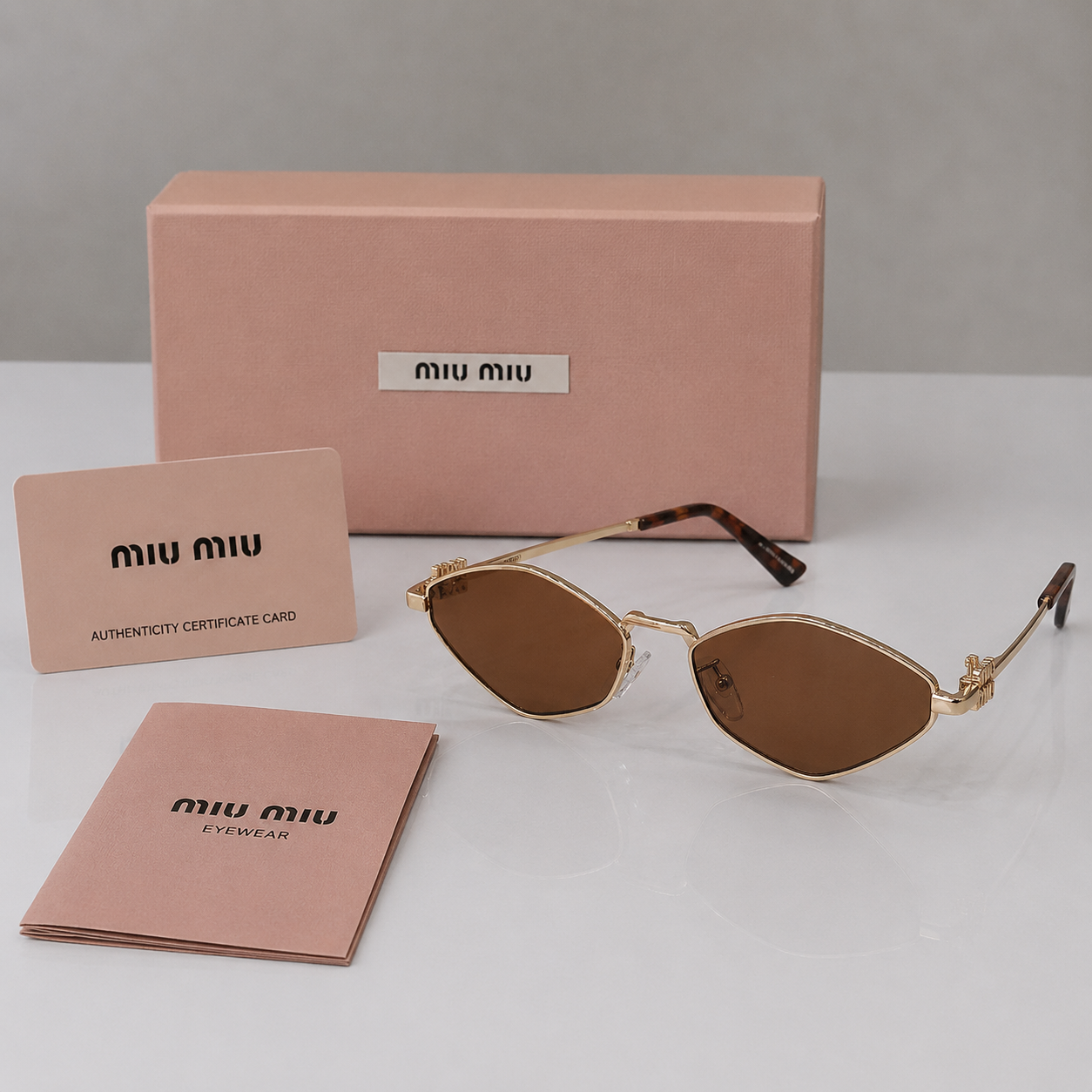 Miu Miu Gold Slim Oval Gradient Sunglasses