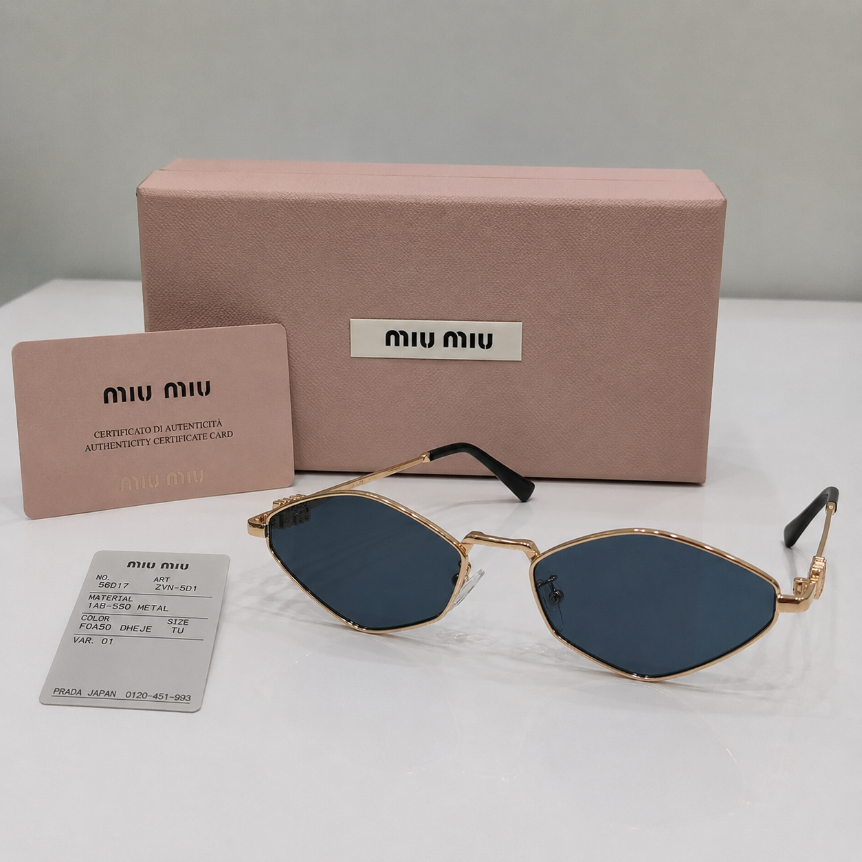 Miu Miu Gold Geometric Slim Sunglasses