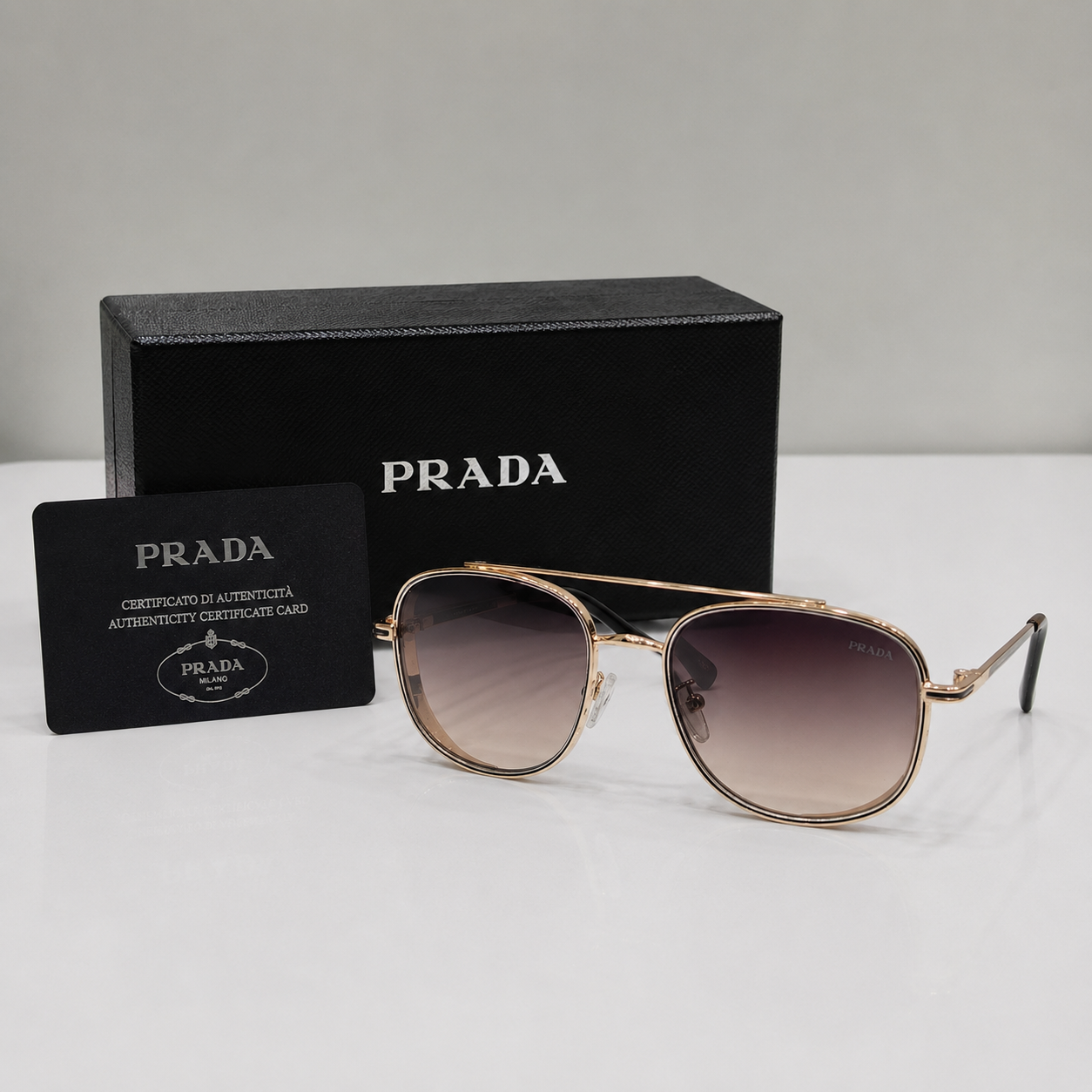 Prada Gold Aviator Gradient Sunglasses