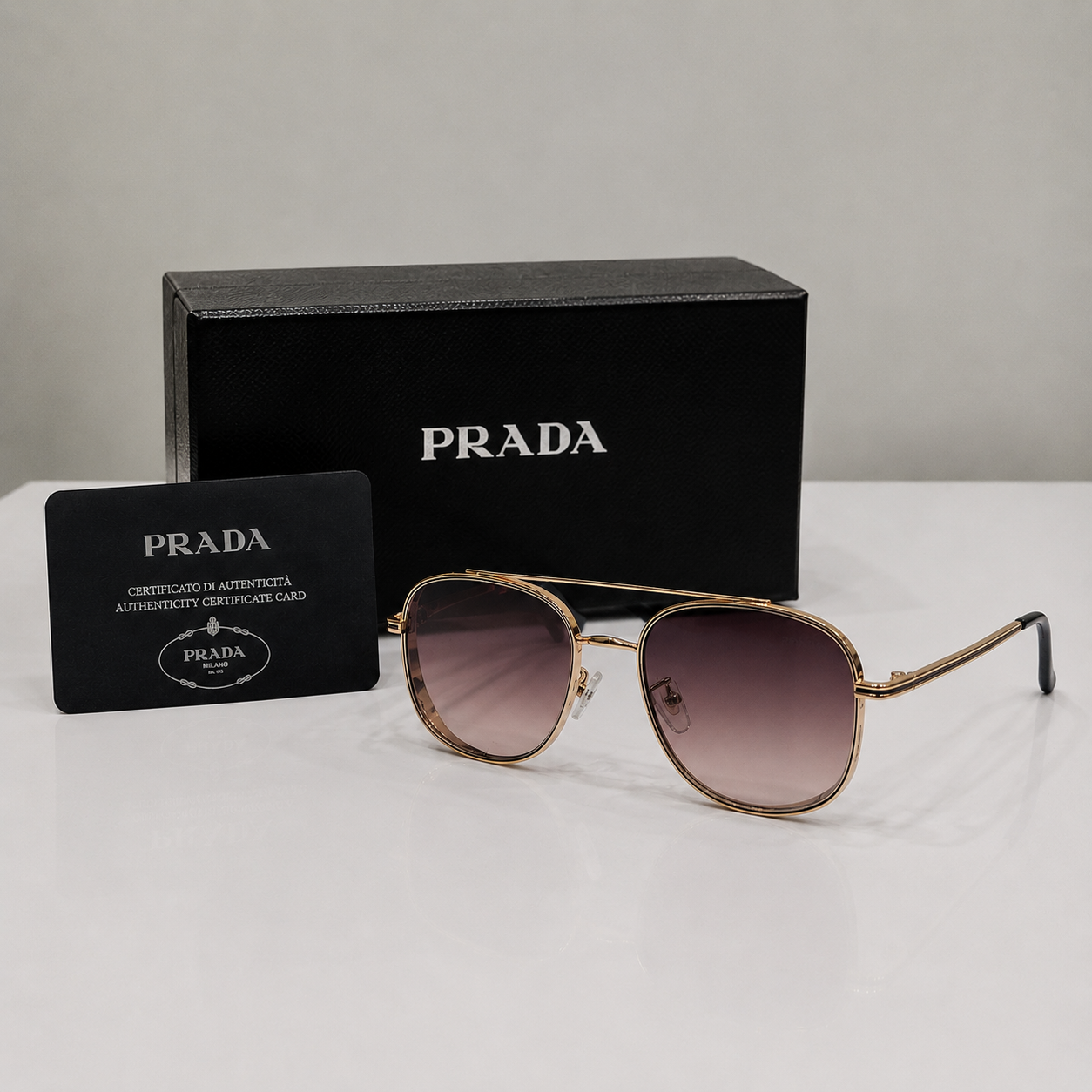 Prada Gold Aviator Gradient Sunglasses