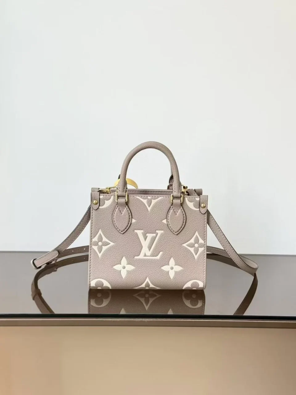 LOUIS-VUITTON-OnTheGo-BB-–-Monogram-Empreinte-Bicolor-1